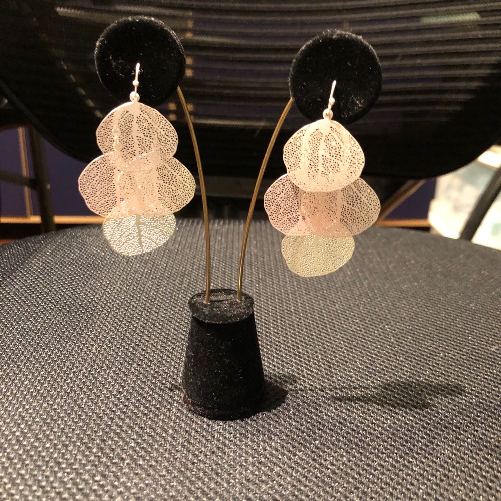 Silver earrings, new. Light weight. 2 1/4” long.